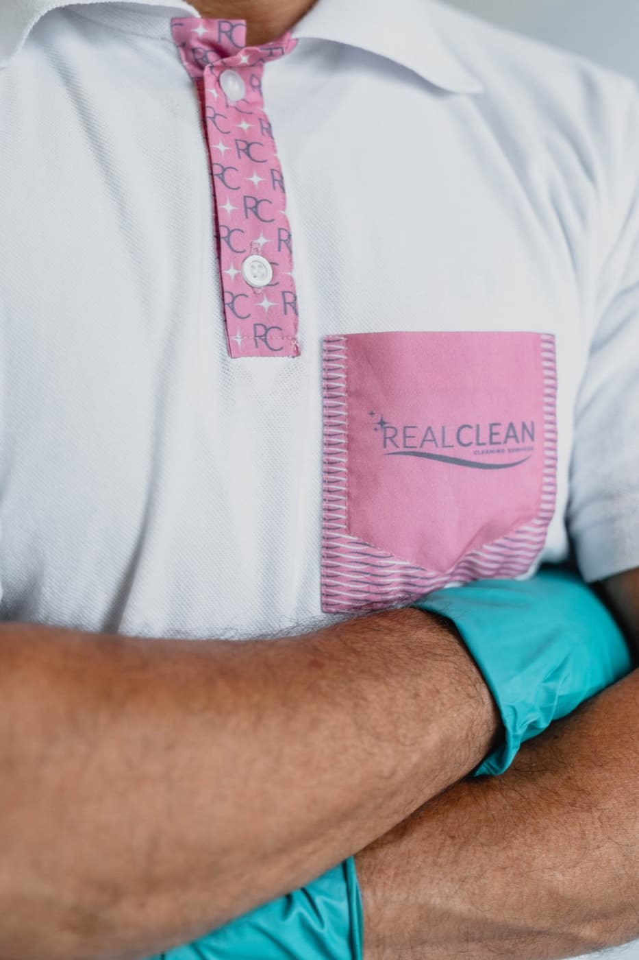 Real Clean professional wearing the branded uniform